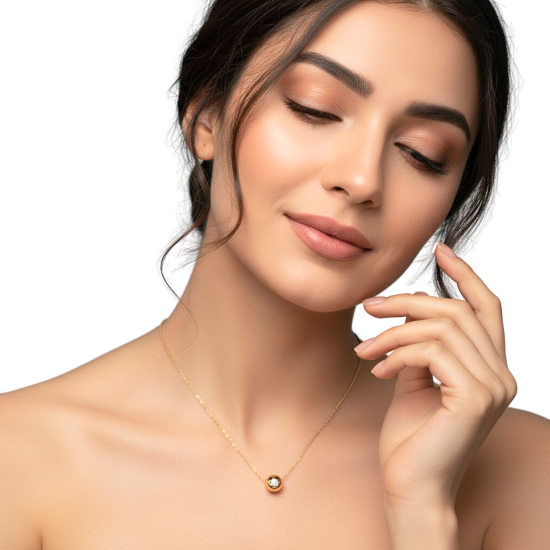 Woman wearing a gold necklace on a white background