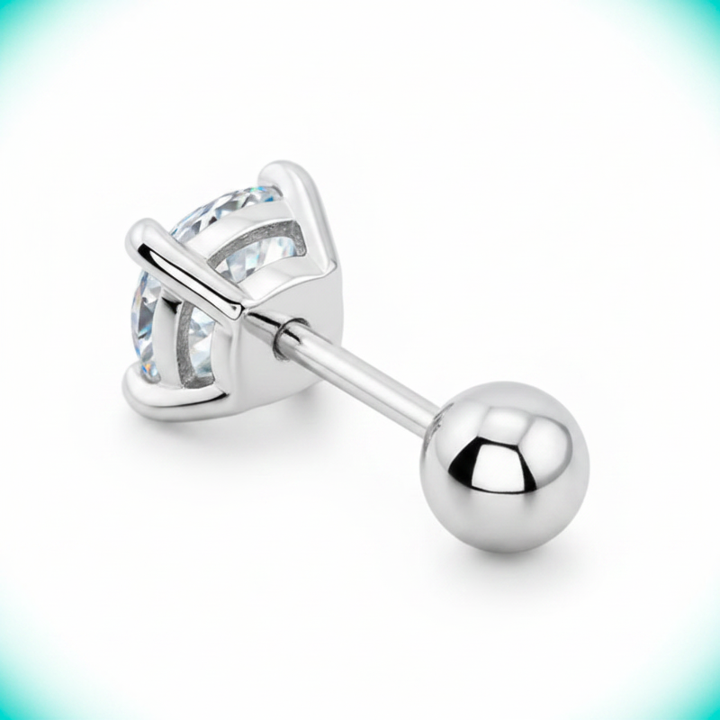 Silver stud earring with a clear gemstone on a light blue gradient background