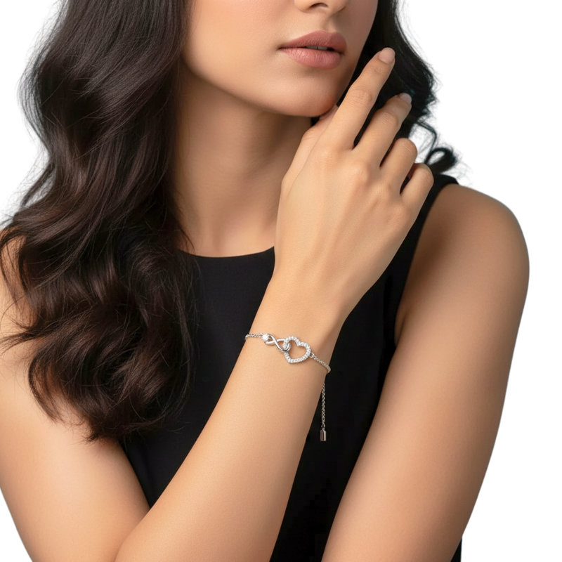 Woman wearing a silver bracelet on a white background