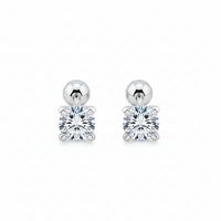 Pair of diamond stud earrings on a white background