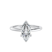 Diamond ring with a marquise-shaped gemstone on a white background
