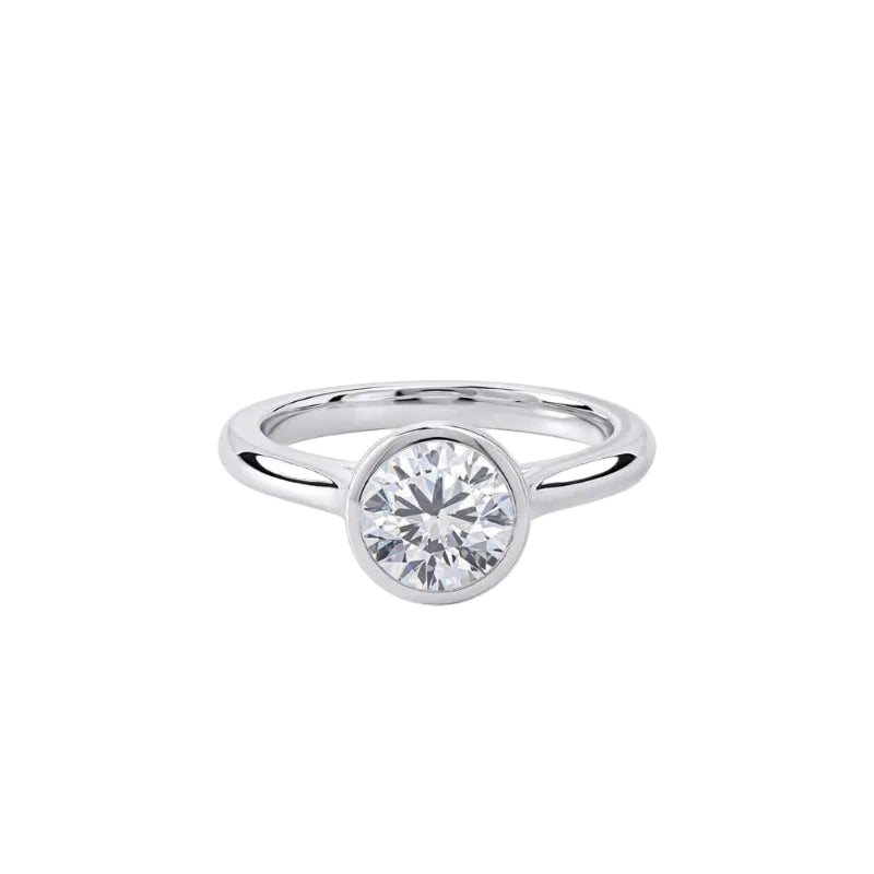Silver ring with a diamond on a white background