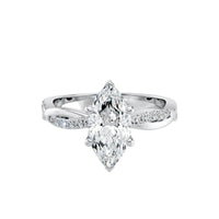 Silver ring with a marquise-shaped diamond on a white background