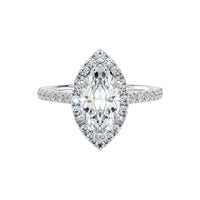 Diamond ring with marquise-shaped center stone on a white background