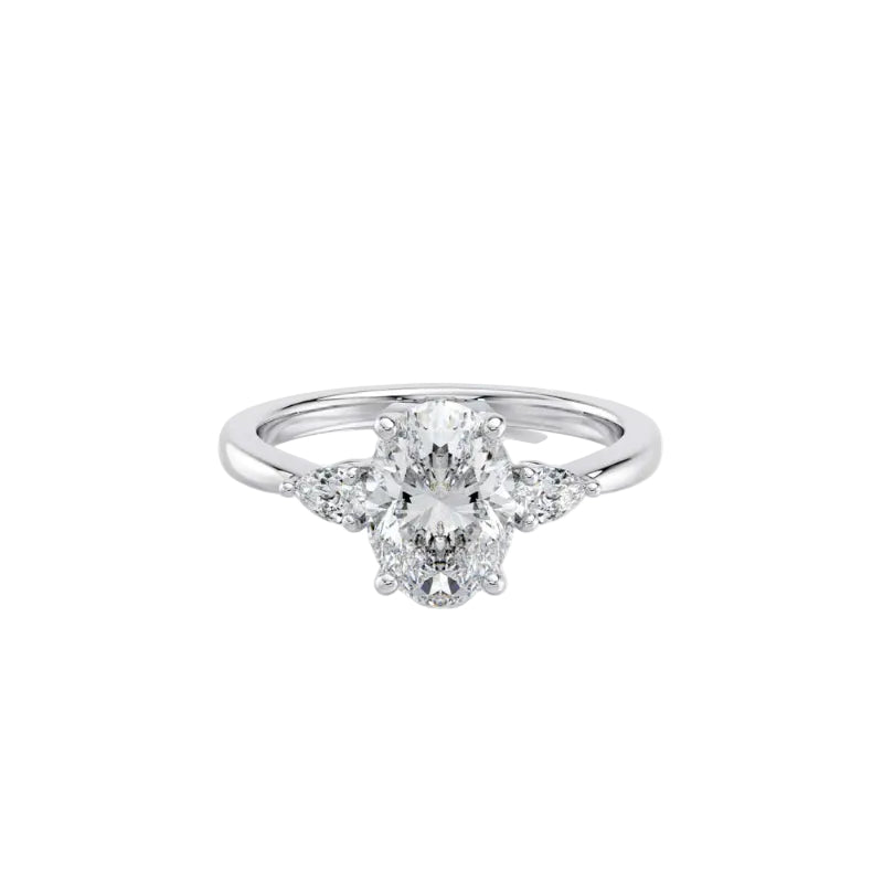 Diamond ring with a central gemstone and smaller stones on a white background