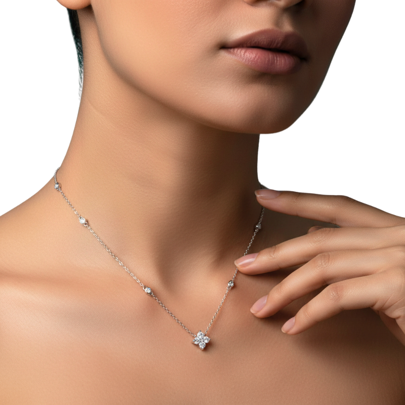 Necklace with a floral pendant worn by a model on a neutral background