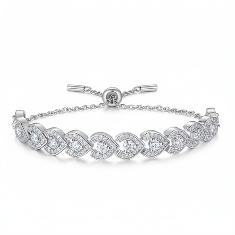 Silver bracelet with heart-shaped diamond designs on a white background