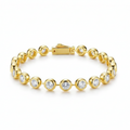 Gold bracelet with clear gemstones on a white background