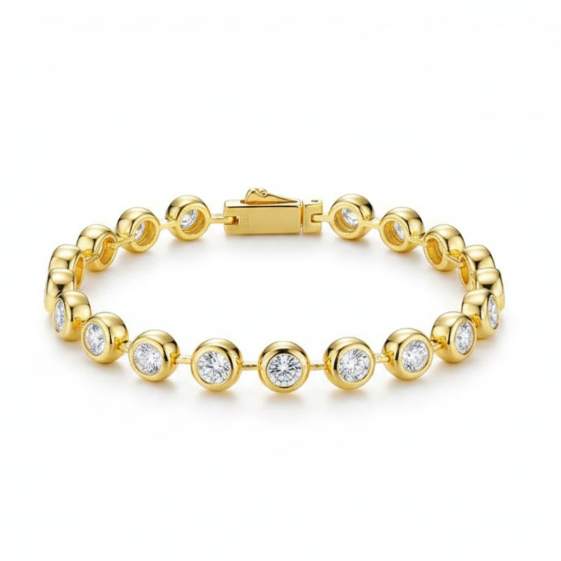 Gold bracelet with clear gemstones on a white background