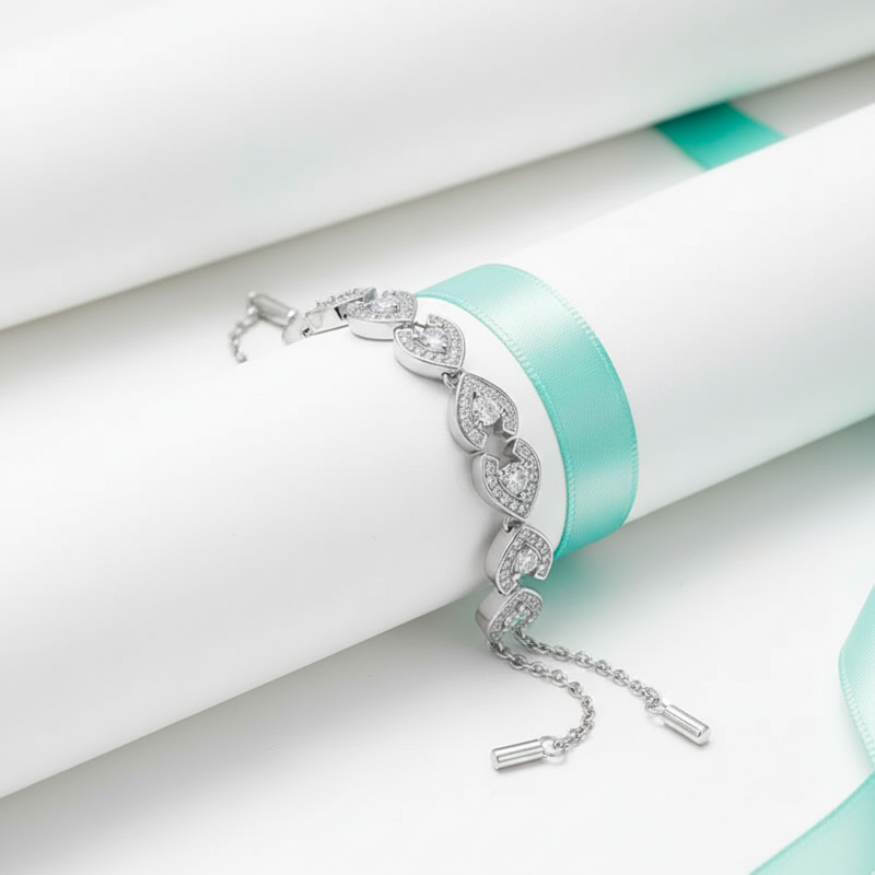 Silver bracelet with turquoise band on a white background