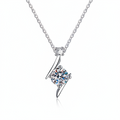Silver necklace with a diamond pendant on a white background