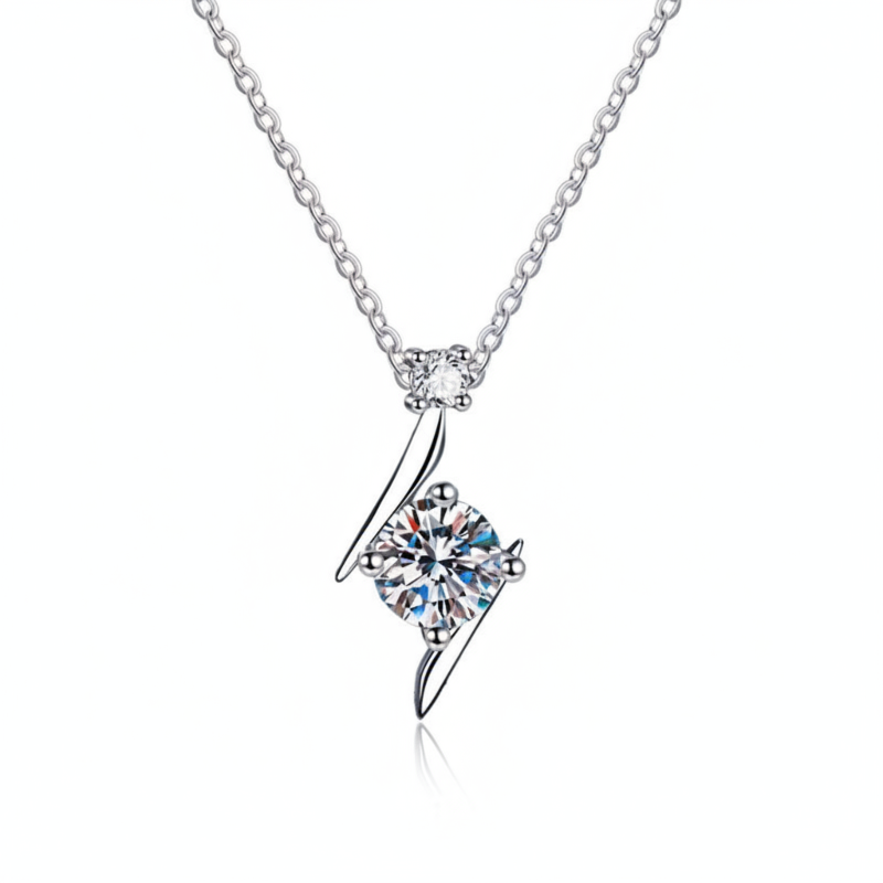 Silver necklace with a diamond pendant on a white background