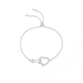 Silver bracelet with heart and infinity symbol on a white background