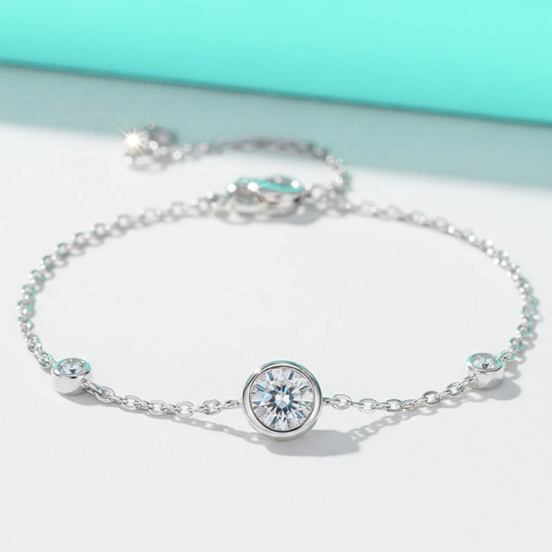 Silver bracelet with a diamond on a light blue background