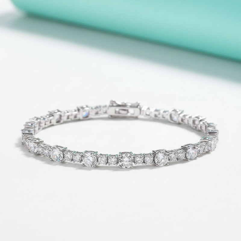 Silver bracelet with diamonds on a light background
