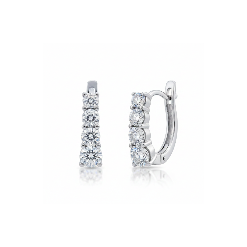 Pair of diamond earrings on a white background