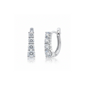 Pair of diamond earrings on a white background