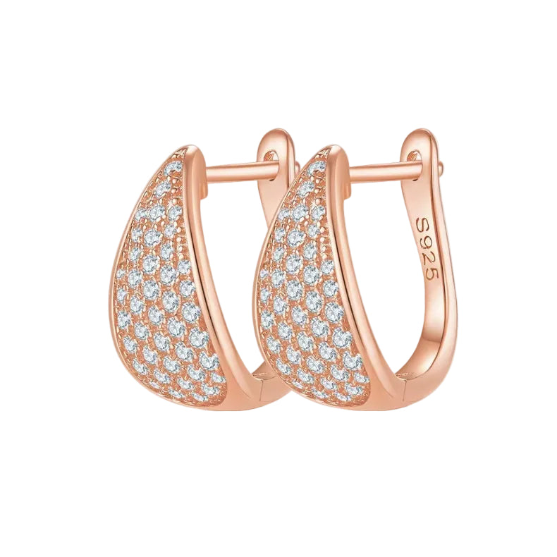 Rose gold hoop earrings with diamonds on a white background