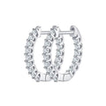 Pair of silver hoop earrings with clear gemstones on a white background inside-out pave hoops earrings diamond
