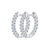 Pair of silver hoop earrings with clear gemstones on a white background inside-out pave hoops earrings diamond