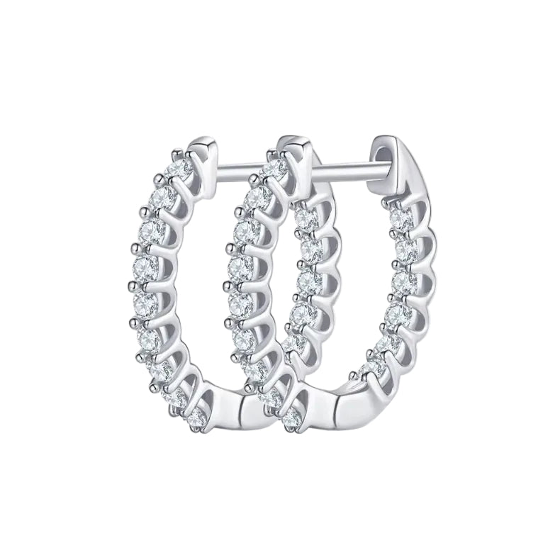 Pair of silver hoop earrings with clear gemstones on a white background inside-out pave hoops earrings diamond