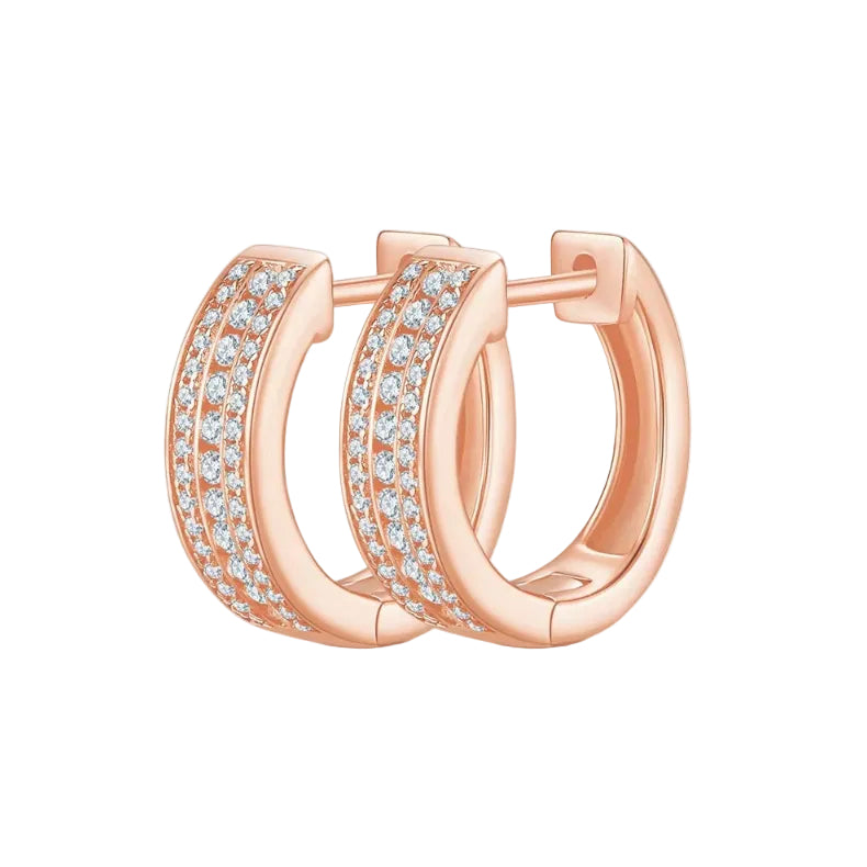 Rose gold hoop earrings with diamond accents on a white background
