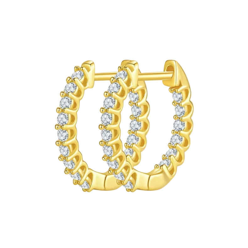 Gold hoop earrings with diamond accents on a white background