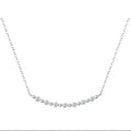 Silver necklace with small diamonds on a white background