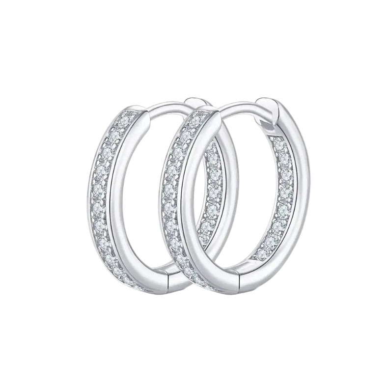 Pair of silver hoop earrings with clear igi certified real diamonds on a white background. Diamond earrings price in pakistan