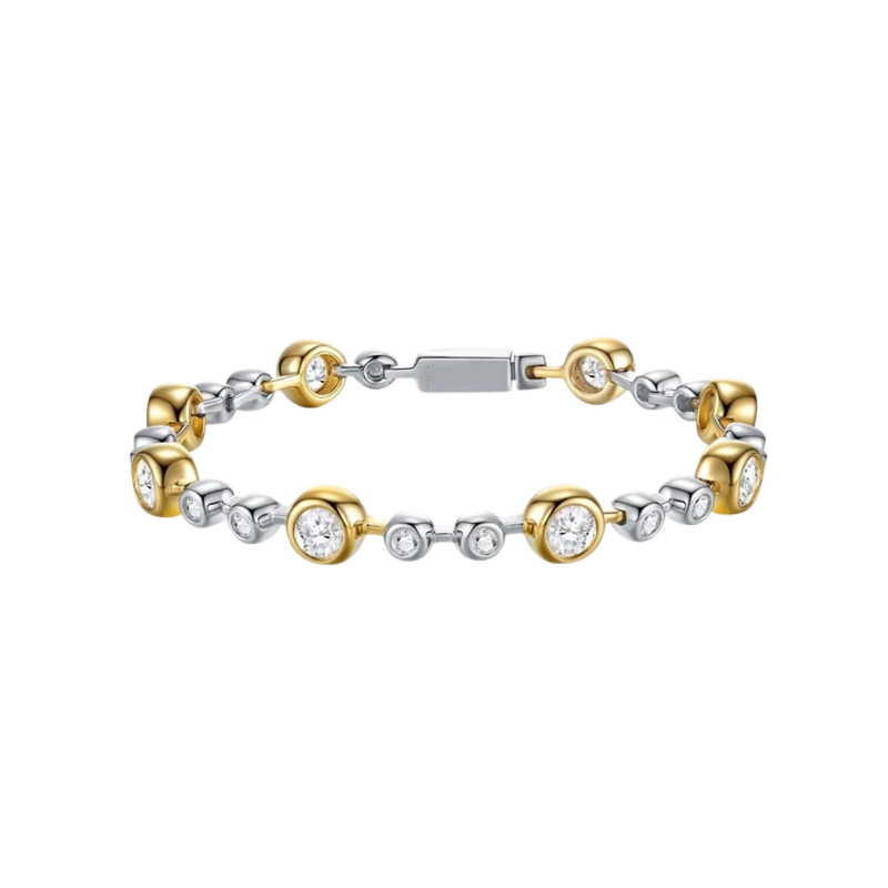 Two-tone gold and silver bracelet with diamond accents on a white background